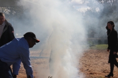Mark Wallace conducting a traditional smoking ceremony
