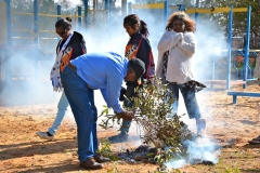 Mark Wallace conducting a traditional smoking ceremony